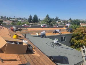 Roofing crew at work