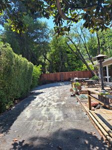 Gravel driveway and fencing